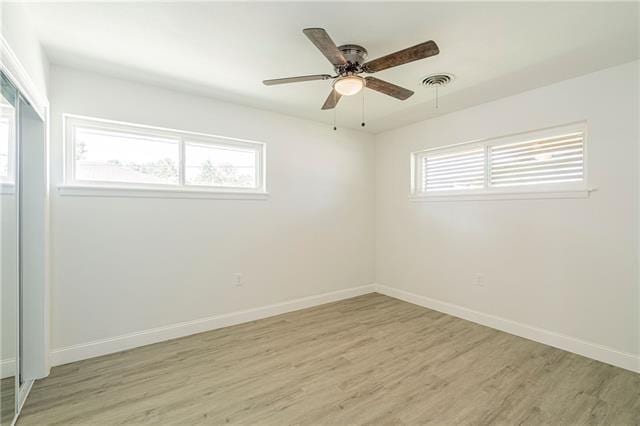 9004 Camille Ct, River Ridge, LA 70123 - spare room with light wood-style flooring, baseboards, and ceiling fan