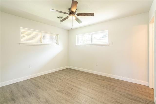 9004 Camille Ct, River Ridge, LA 70123 - spare room featuring wood finished floors, baseboards, and ceiling fan