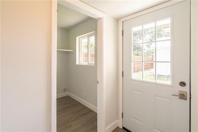 9004 Camille Ct, River Ridge, LA 70123 - doorway to outside featuring baseboards and wood finished floors