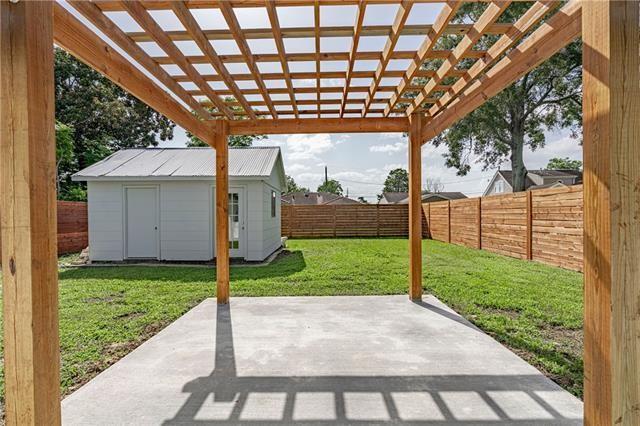 9004 Camille Ct, River Ridge, LA 70123 - view of patio featuring a storage shed, an outbuilding, and a pergola