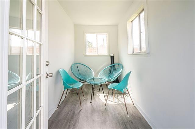9004 Camille Ct, River Ridge, LA 70123 - sitting room featuring baseboards and wood finished floors