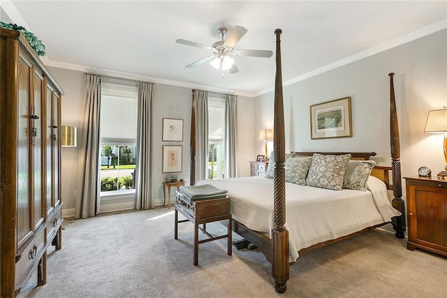 1641 Continental Dr, Covington, LA 70433 - bedroom featuring ornamental molding, light carpet, baseboards, and ceiling fan
