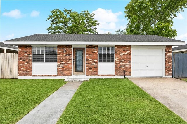 2525 Joy Ann Dr, Marrero, LA 70072 - ranch-style house featuring brick siding, driveway, and a garage