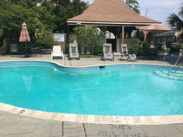 736 Village Rd Unit A, Kenner, LA 70065 - community pool with a gazebo and a patio area