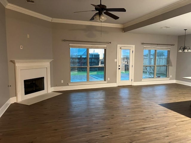40153 Maison Lafitte Blvd, Ponchatoula, LA 70454 - unfurnished living room with dark wood-style floors, ornamental molding, a ceiling fan, a fireplace with flush hearth, and a chandelier