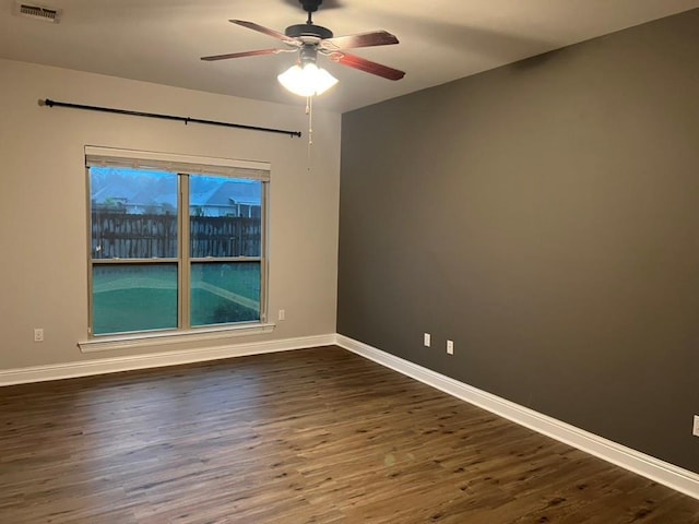 40153 Maison Lafitte Blvd, Ponchatoula, LA 70454 - empty room with dark wood finished floors and a ceiling fan