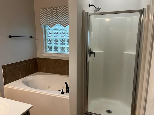 40153 Maison Lafitte Blvd, Ponchatoula, LA 70454 - full bathroom featuring a shower stall, vanity, and a whirlpool tub