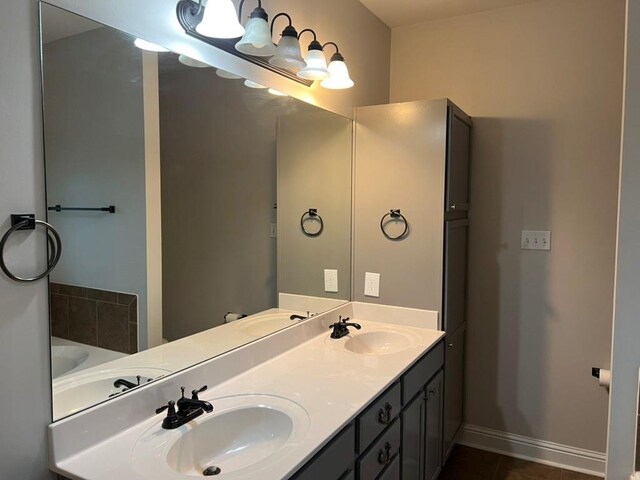 40153 Maison Lafitte Blvd, Ponchatoula, LA 70454 - full bathroom featuring double vanity, tile patterned flooring, and a bathtub