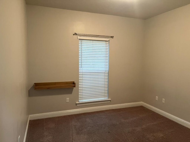 40153 Maison Lafitte Blvd, Ponchatoula, LA 70454 - unfurnished room with baseboards and dark carpet