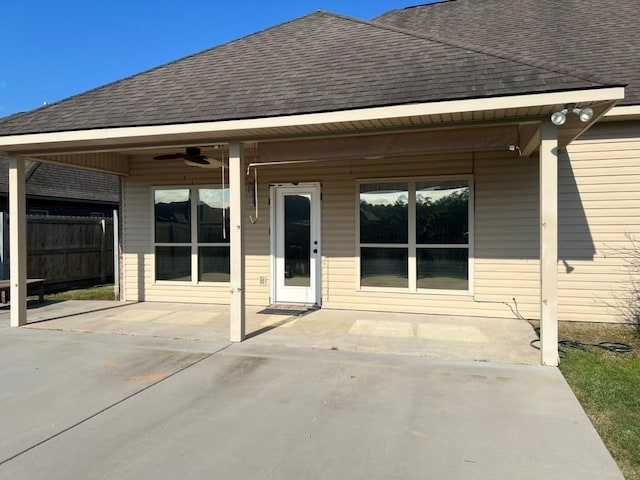 40153 Maison Lafitte Blvd, Ponchatoula, LA 70454 - rear view of property featuring roof with shingles, a patio, and a ceiling fan