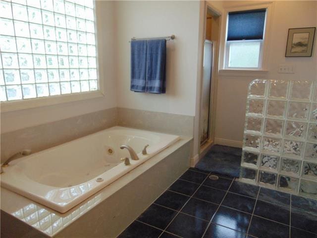 3008 Beaulieu St, Metairie, LA 70001 - full bathroom with a shower with door, tile patterned flooring, and a jetted tub
