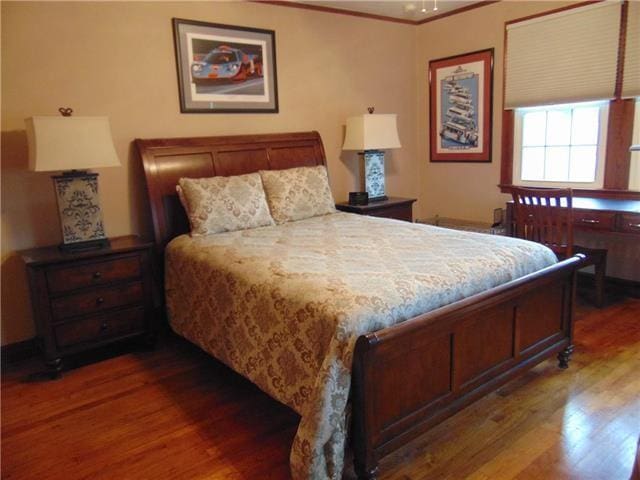 3008 Beaulieu St, Metairie, LA 70001 - bedroom featuring wood finished floors and ornamental molding
