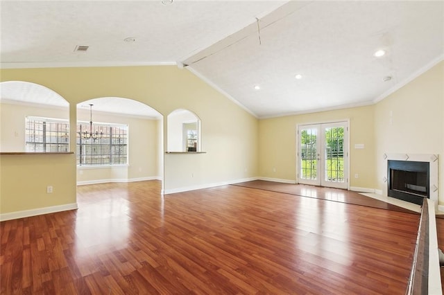 5736 E Louis Prima Dr, New Orleans, LA 70128 - unfurnished living room featuring wood finished floors, ornamental molding, a chandelier, a fireplace with flush hearth, and baseboards