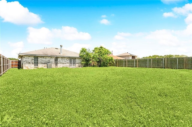 5736 E Louis Prima Dr, New Orleans, LA 70128 - view of yard with central AC unit