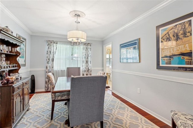 1417 Washington Ct, Slidell, LA 70458 - dining area with wood finished floors, crown molding, and a chandelier