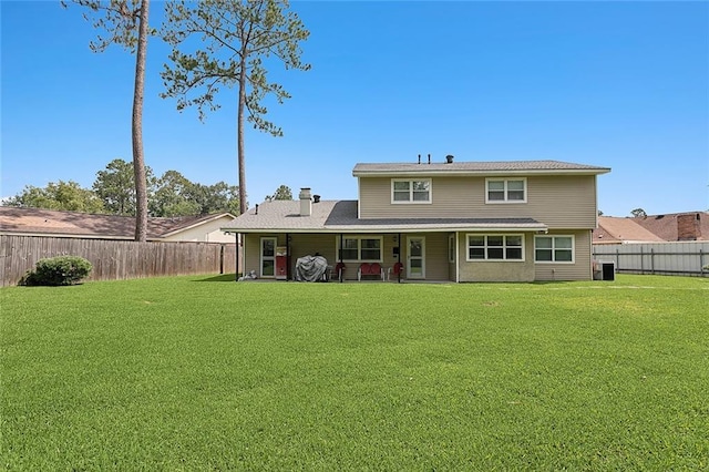 1417 Washington Ct, Slidell, LA 70458 - rear view of property with a fenced backyard and a chimney