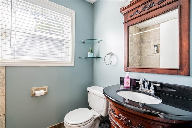 4401 Apollo Dr, Metairie, LA 70003 - bathroom featuring toilet, healthy amount of natural light, and vanity