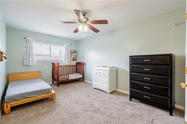 4401 Apollo Dr, Metairie, LA 70003 - bedroom featuring carpet, ceiling fan, and baseboards