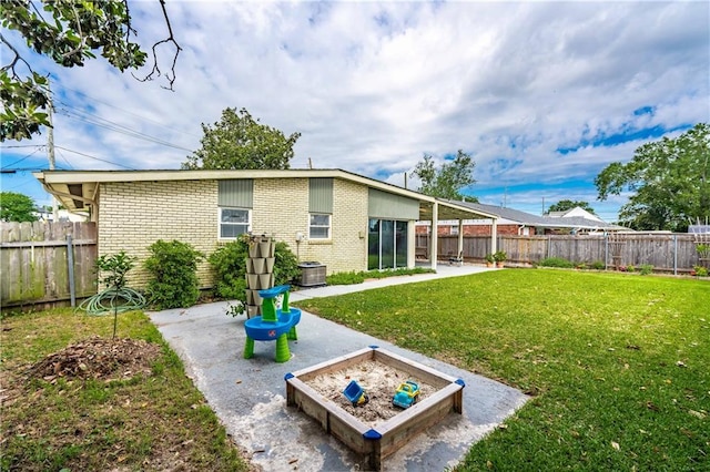 4401 Apollo Dr, Metairie, LA 70003 - rear view of property with brick siding, a patio area, and cooling unit