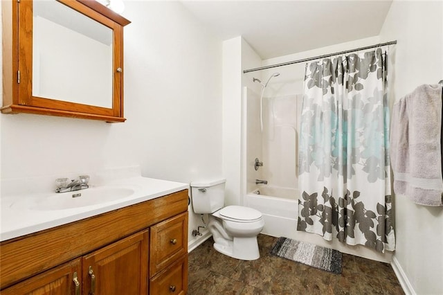 3113 Terrace Ave, Slidell, LA 70458 - bathroom featuring baseboards, toilet, shower / tub combo with curtain, vanity, and stone finish flooring