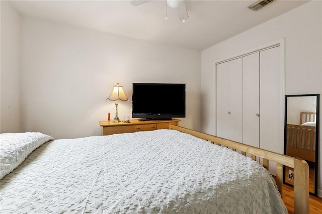 3113 Terrace Ave, Slidell, LA 70458 - bedroom with a closet, ceiling fan, and wood finished floors
