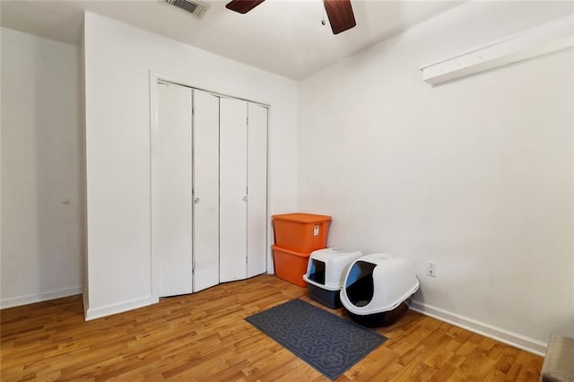 3113 Terrace Ave, Slidell, LA 70458 - bedroom featuring light wood-type flooring, baseboards, a closet, and ceiling fan