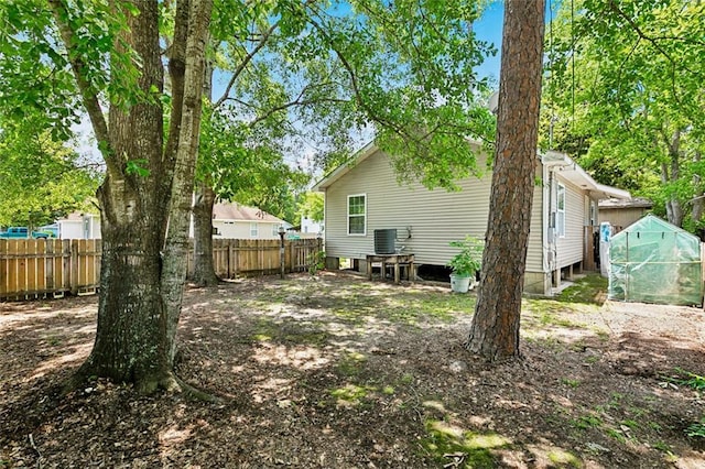 3113 Terrace Ave, Slidell, LA 70458 - back of house featuring an exterior structure, an outbuilding, and central AC unit