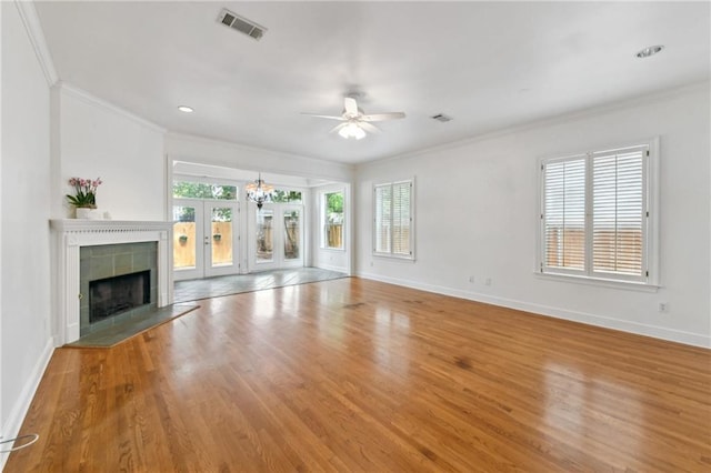 506 Papworth Ave, Metairie, LA 70005 - unfurnished living room featuring crown molding, ceiling fan, baseboards, and wood finished floors