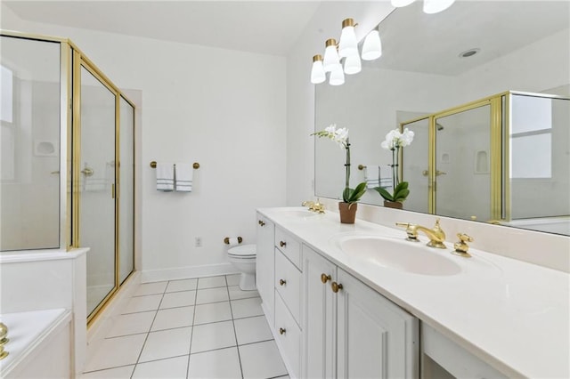 506 Papworth Ave, Metairie, LA 70005 - bathroom featuring tile patterned floors, a stall shower, double vanity, and toilet