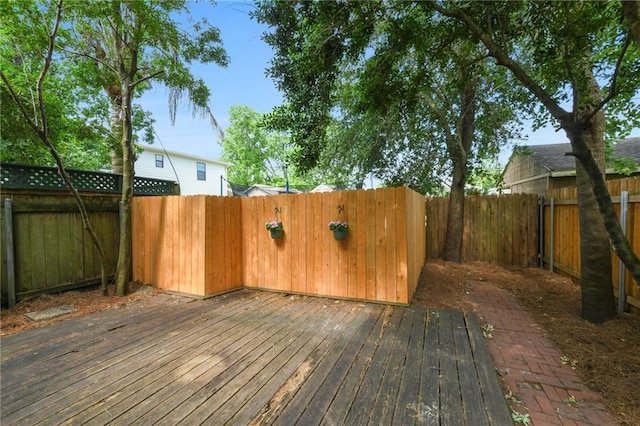 506 Papworth Ave, Metairie, LA 70005 - wooden deck with a fenced backyard