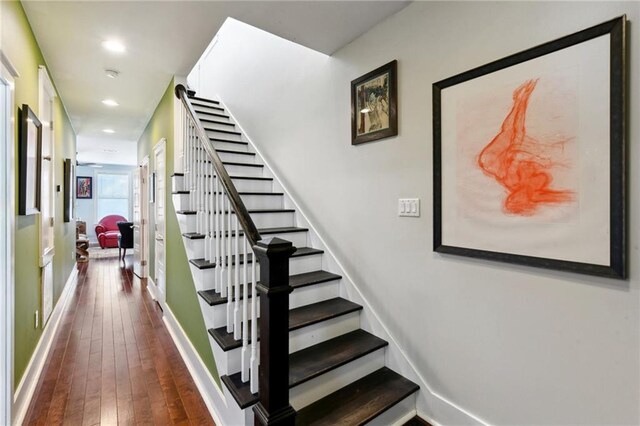 2728 Bienville St, New Orleans, LA 70119 - staircase with wood-type flooring, recessed lighting, and baseboards