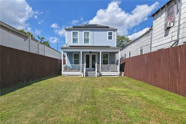 2728 Bienville St, New Orleans, LA 70119 - rear view of property featuring french doors, a porch, ceiling fan, solar panels, and cooling unit