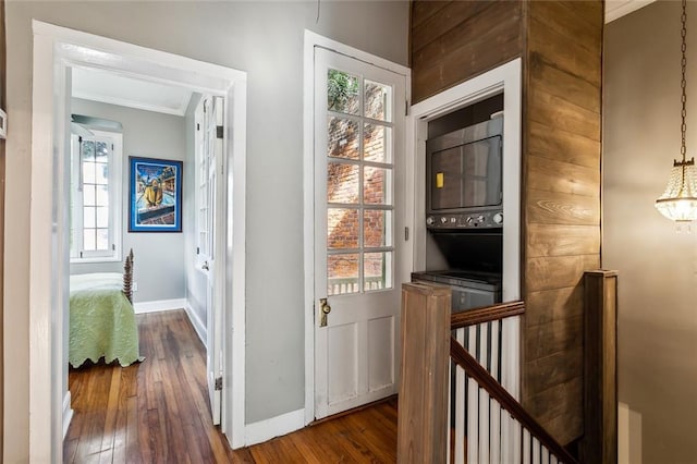 826 Bourbon St Unit B, New Orleans, LA 70116 - hallway with an upstairs landing, crown molding, dark wood finished floors, and plenty of natural light