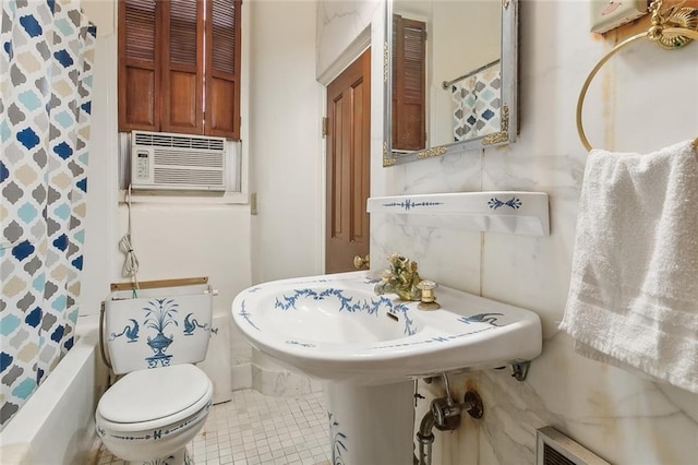 519 Madison St Unit C, New Orleans, LA 70116 - full bathroom with shower / tub combo and tile patterned flooring