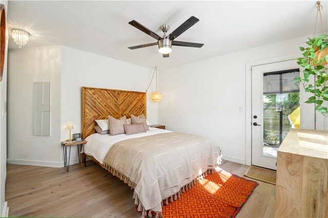 2712 Saint Thomas St, New Orleans, LA 70130 - bedroom featuring light wood finished floors, baseboards, and a ceiling fan