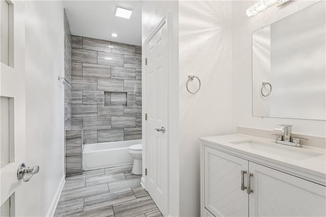 313331 Clouet St, New Orleans, LA 70126 - bathroom with vanity, toilet, baseboards, washtub / shower combination, and recessed lighting