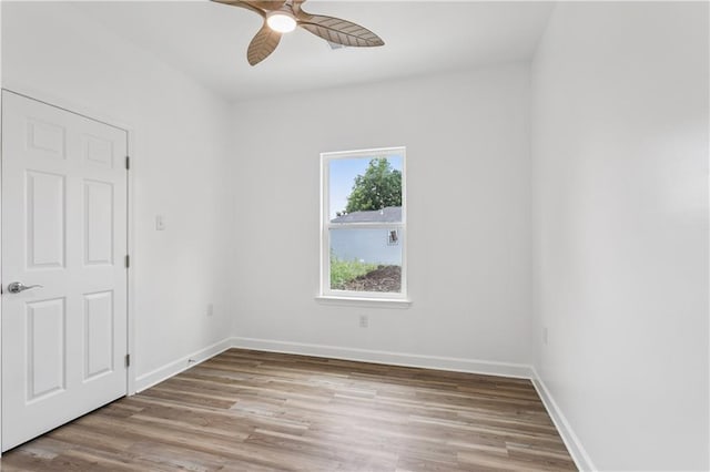 313331 Clouet St, New Orleans, LA 70126 - unfurnished room featuring ceiling fan, wood finished floors, and baseboards