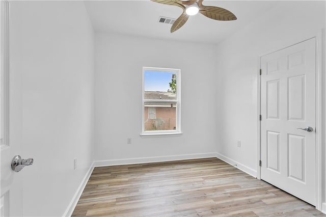 313331 Clouet St, New Orleans, LA 70126 - unfurnished room featuring ceiling fan, light wood-style floors, and baseboards