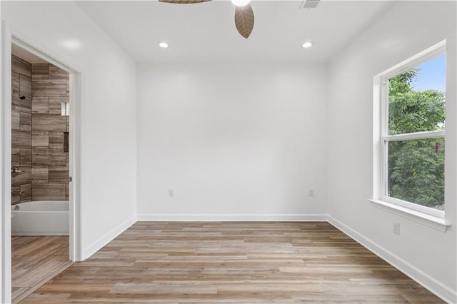 313331 Clouet St, New Orleans, LA 70126 - unfurnished room with ceiling fan, light wood-style flooring, recessed lighting, and baseboards