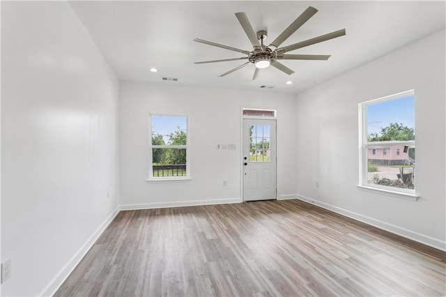 313331 Clouet St, New Orleans, LA 70126 - entryway with wood finished floors, ceiling fan, baseboards, and recessed lighting