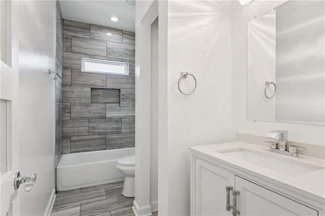 313331 Clouet St, New Orleans, LA 70126 - bathroom with vanity, toilet, bathtub / shower combination, and baseboards