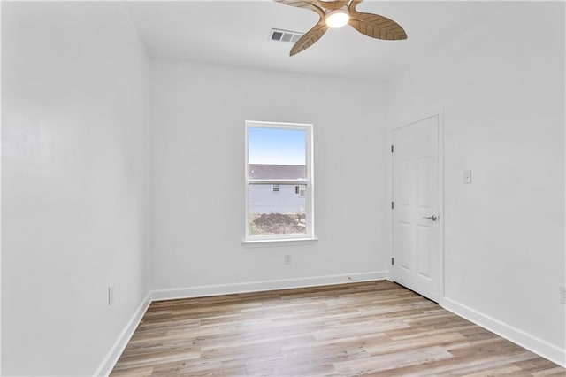 313331 Clouet St, New Orleans, LA 70126 - spare room featuring ceiling fan, light wood-type flooring, and baseboards