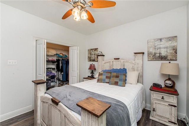 bedroom with baseboards, dark wood finished floors, a closet, and ceiling fan