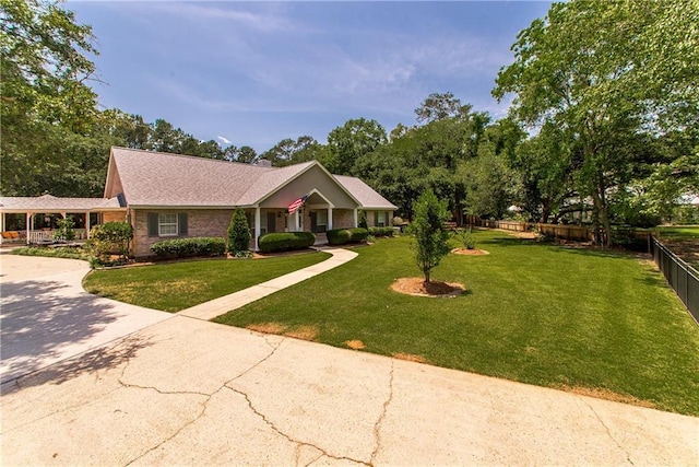 ranch-style house with concrete driveway