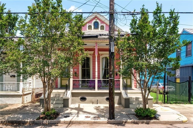 2329 Dauphine St, New Orleans, LA 70117 - view of front of property with covered porch