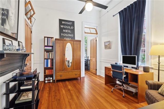 2329 Dauphine St, New Orleans, LA 70117 - office space featuring plenty of natural light, wood finished floors, and ceiling fan