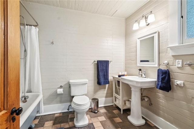2329 Dauphine St, New Orleans, LA 70117 - full bath with wood ceiling, toilet, and shower / tub combo with curtain