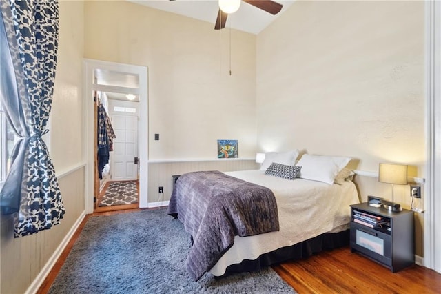 2329 Dauphine St, New Orleans, LA 70117 - bedroom featuring ceiling fan and wainscoting