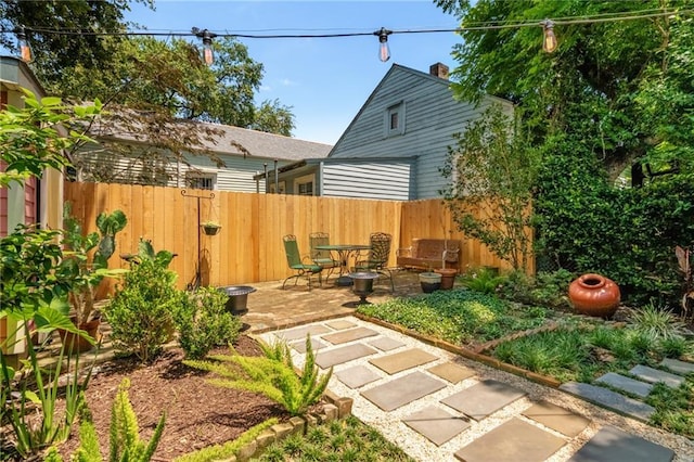 2329 Dauphine St, New Orleans, LA 70117 - fenced backyard with a patio