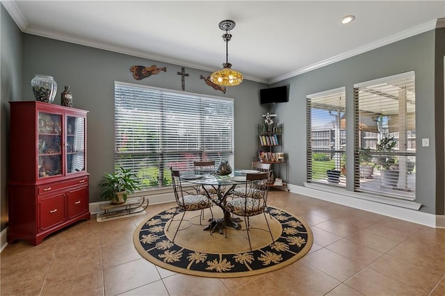 11446 Copperwood Dr, Denham Springs, LA 70726 - dining space with plenty of natural light, light tile patterned floors, crown molding, baseboards, and recessed lighting